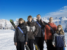 Skiing with children - The SkiSling ensures they can carry their own skis!